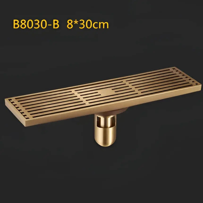Antique brass linear shower floor drain with carved cover for bathroom