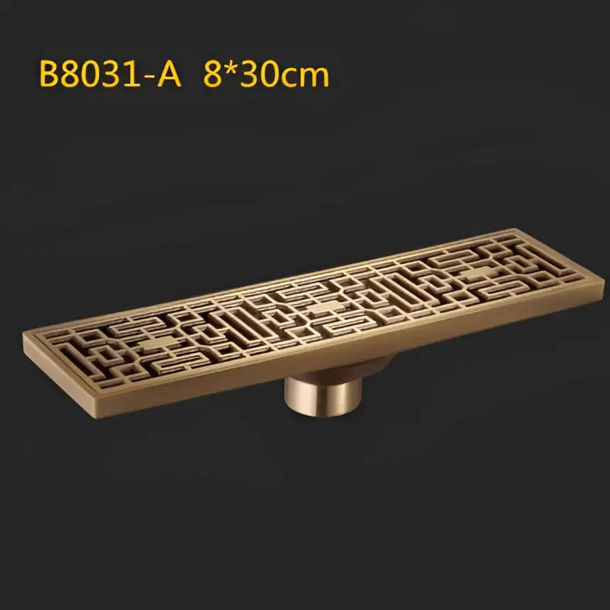 Antique brass linear shower floor drain with carved cover for bathroom