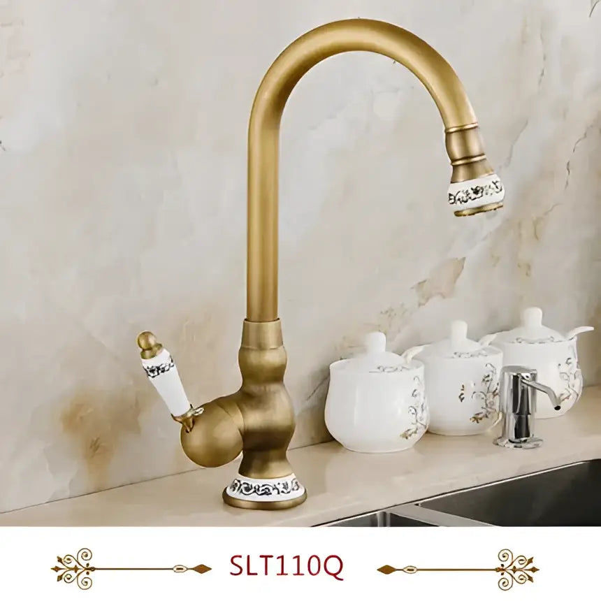 Antique brass swivel spout kitchen faucet with floral ceramic handle