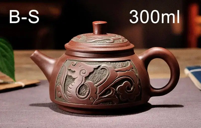 Antique bronze teapot set with dragon motifs for dining room