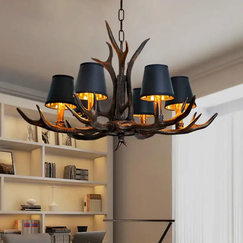 Rustic dark metallic antler chandelier with black shades dining room