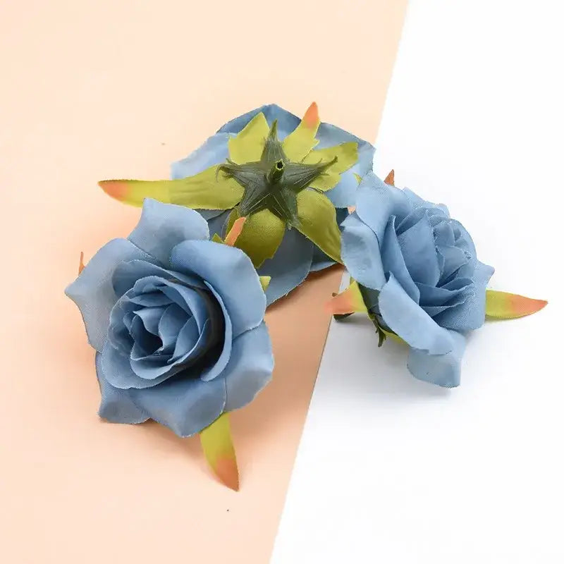 Assorted pastel and vibrant artificial silk roses – wedding decor