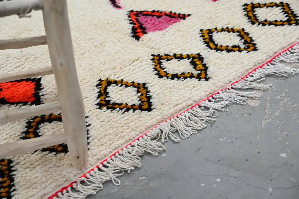 Handmade moroccan azilal rug beige and red living room decor