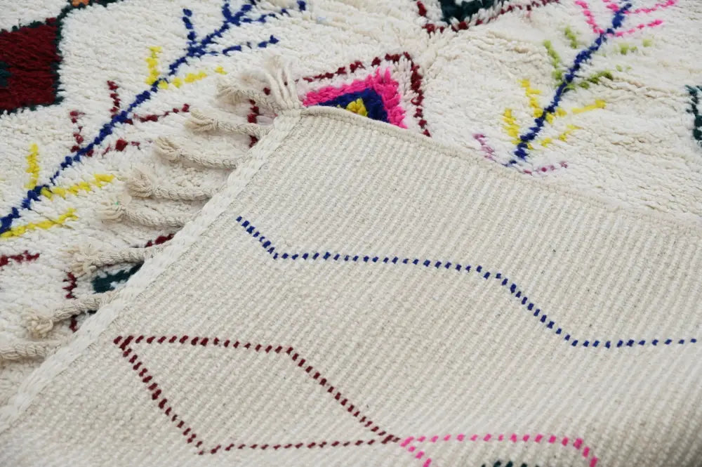 Handmade beige moroccan azilal rug with colorful diamonds living room
