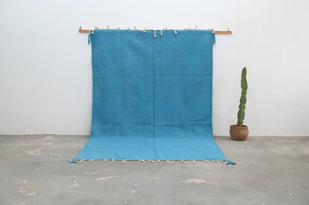 Handmade traditional azilal rug turquoise living room decor with tassels
