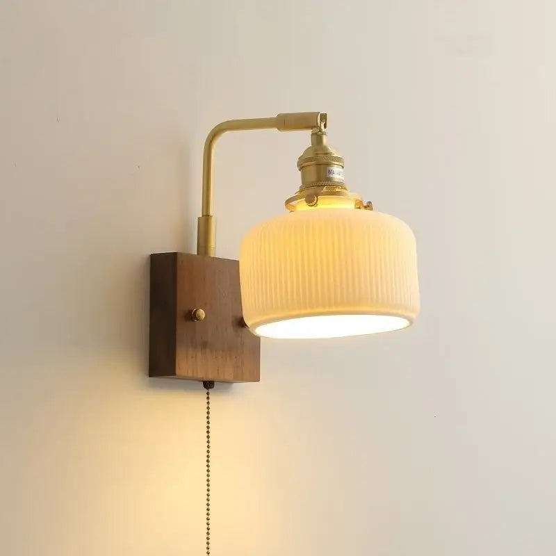 Brass and wood globe wall sconce bedroom light fixture