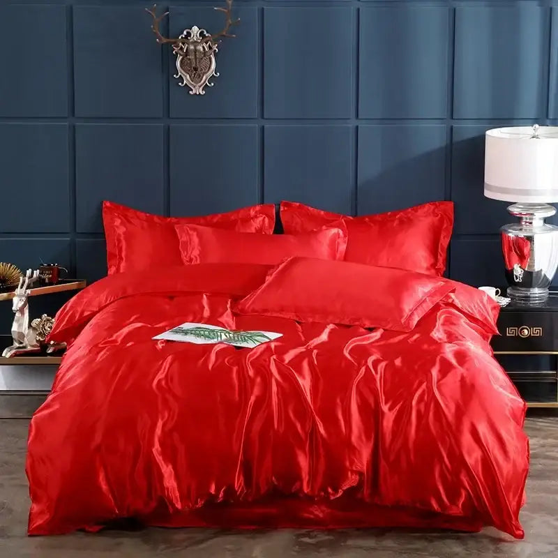 Luxurious crimson satin duvet cover and bed sheet bedroom set