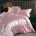 Pink glossy satin ruffled bedding set with fitted sheet bedroom