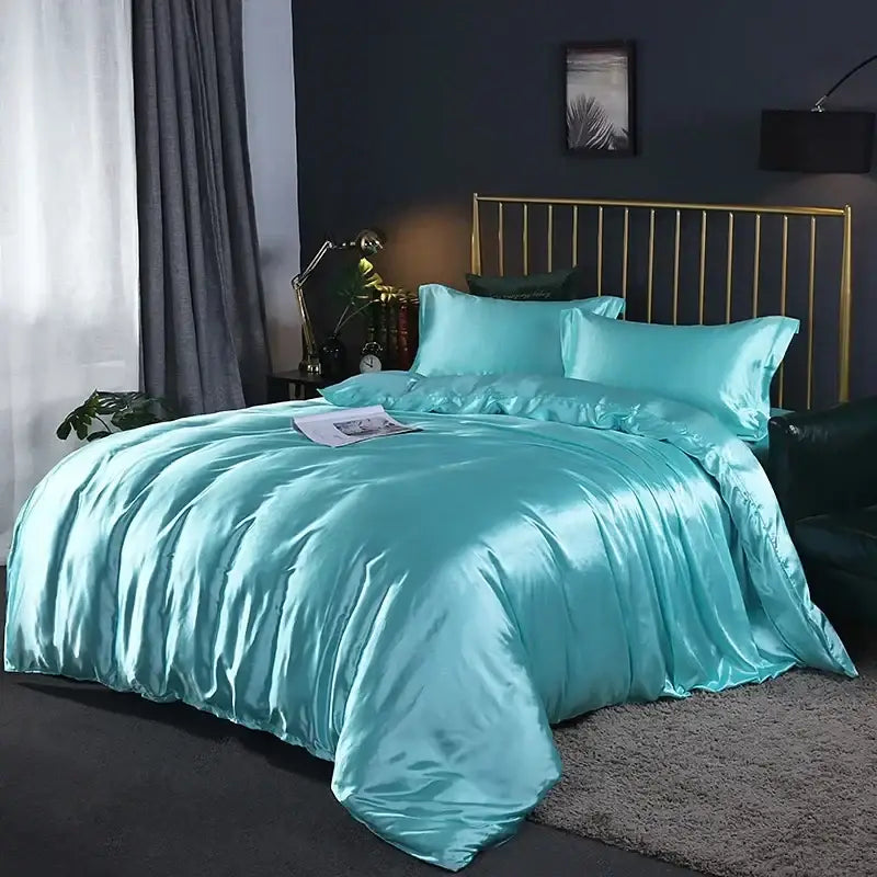 Teal satin bed sheet set with matching pillowcases for bedroom