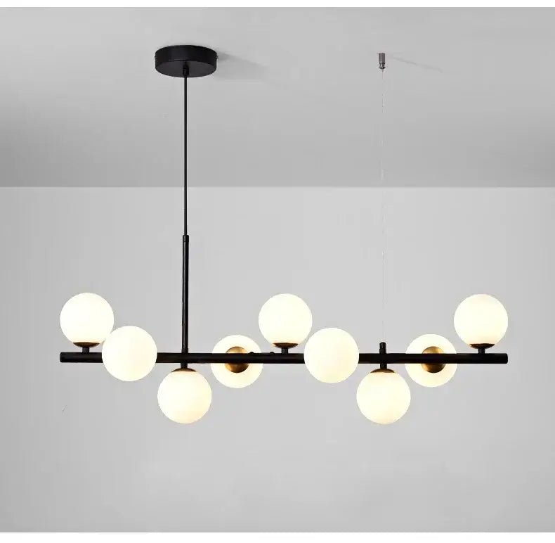 Sleek black metal glass ball chandelier for dining room