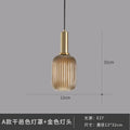 Elegant amber ribbed glass pendant lights for dining room
