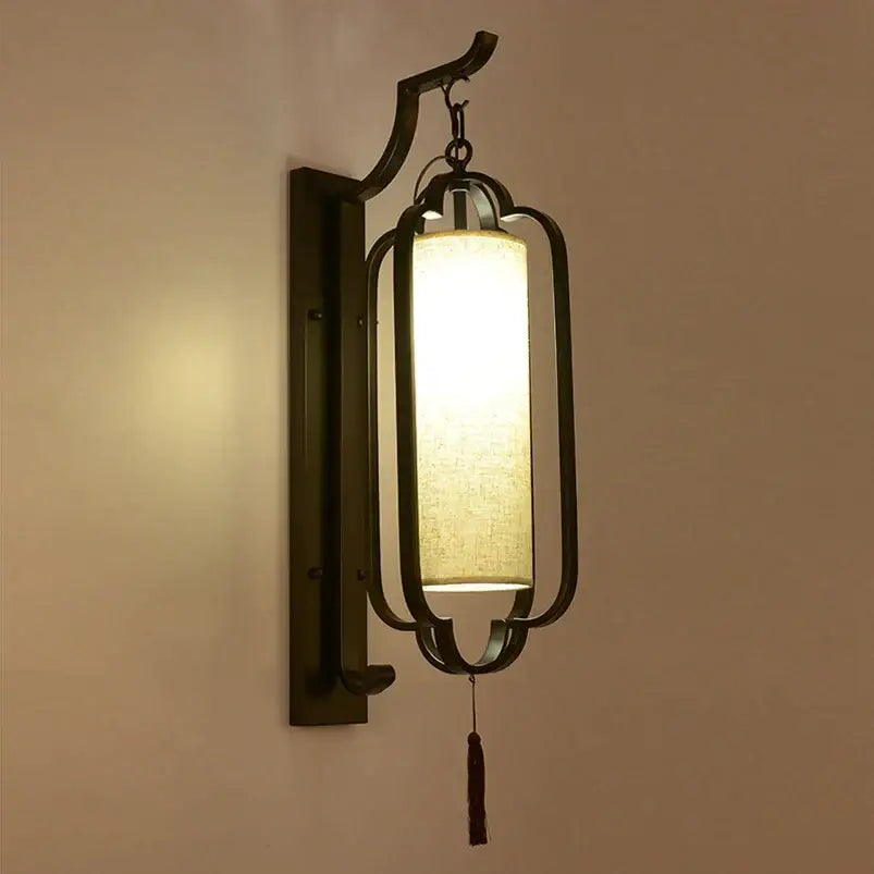 Elegant black wrought iron wall sconce lamp with tassel bedroom light