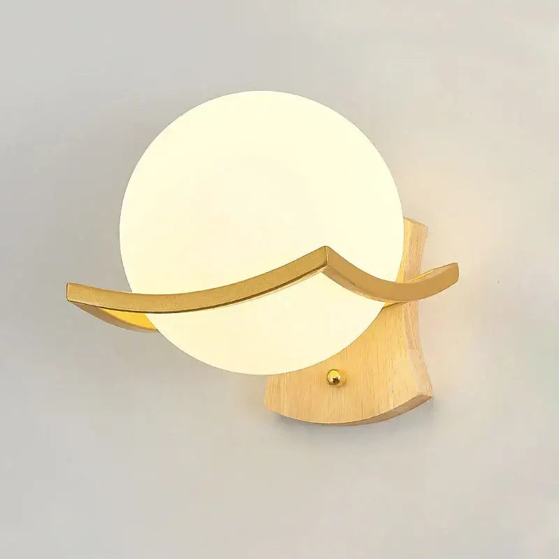 Elegant gold iron wall lamp with frosted glass shade for bedroom