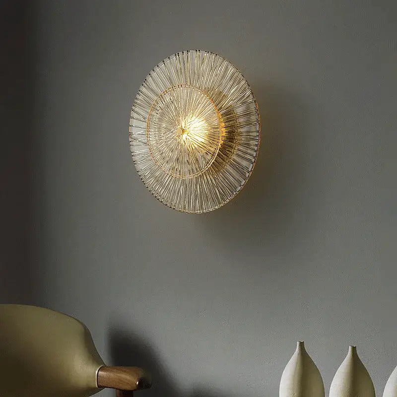 Elegant ribbed glass and gold wall sconces for living room
