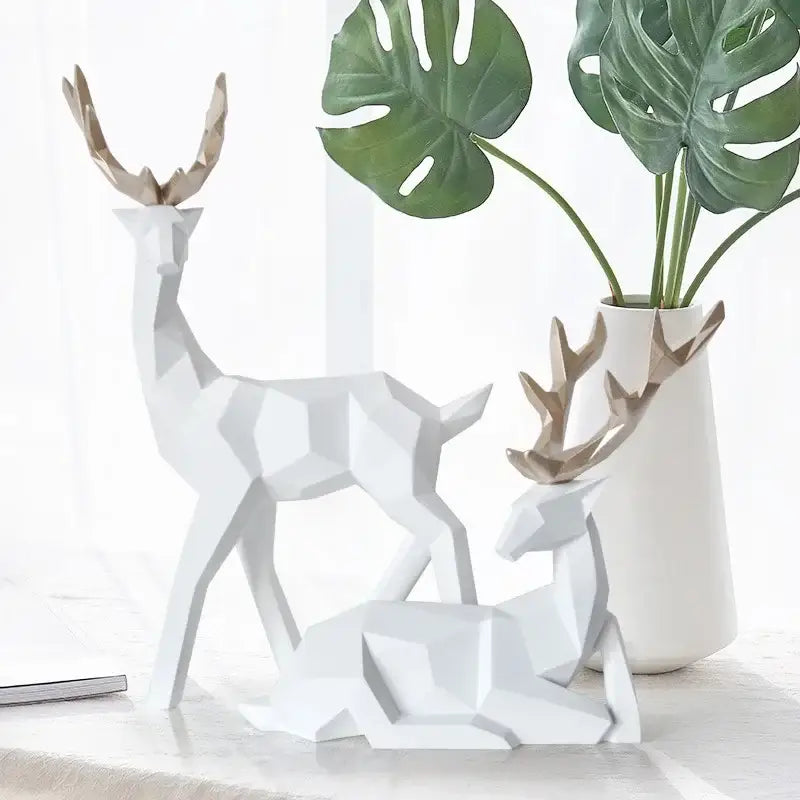Geometric black & white deer sculpture living room decor with gold antlers