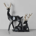 Geometric black & white deer sculpture living room decor with gold antlers
