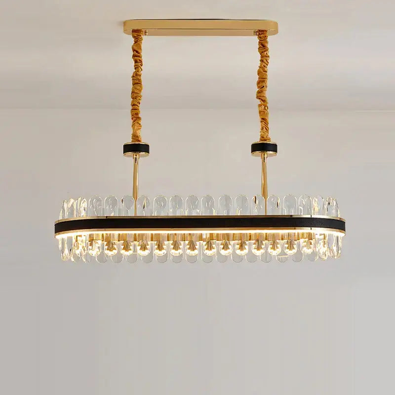 Gold stainless steel crystal chandelier dining room leather detail