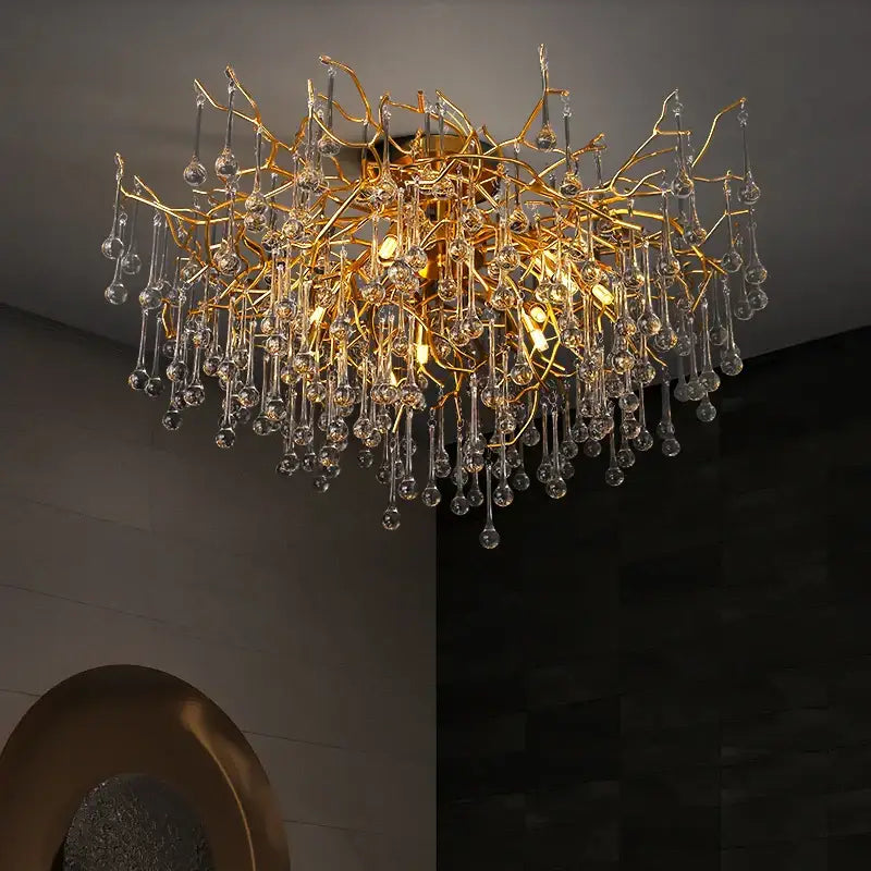 Gold tree branch chandelier with crystal droplets for dining room