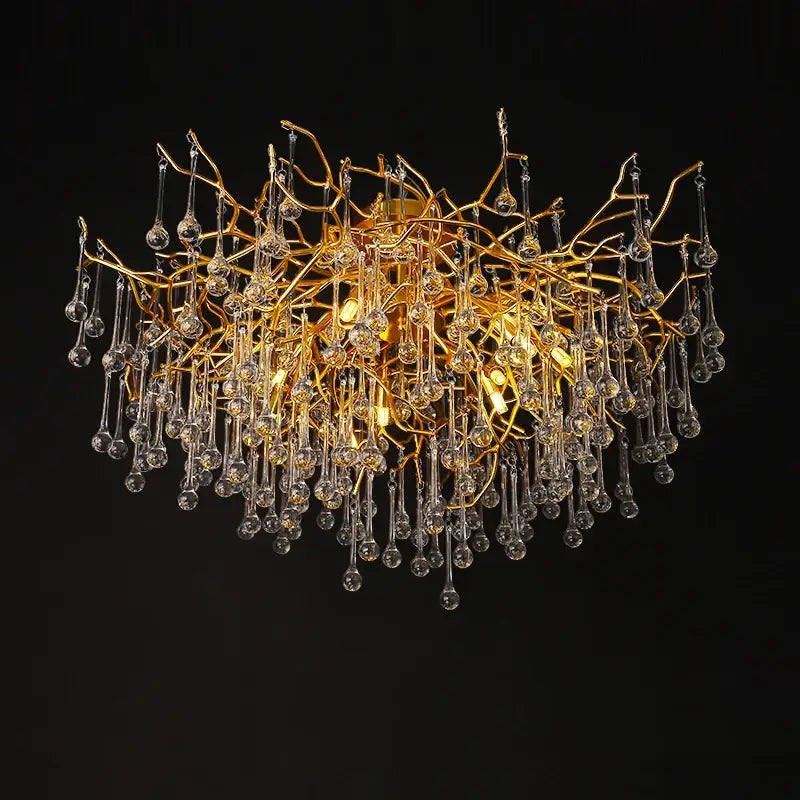 Gold tree branch chandelier with crystal droplets for dining room