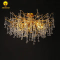 Gold tree branch chandelier with crystal droplets for dining room