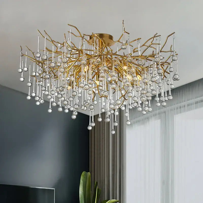 Gold tree branch chandelier with crystal droplets for dining room
