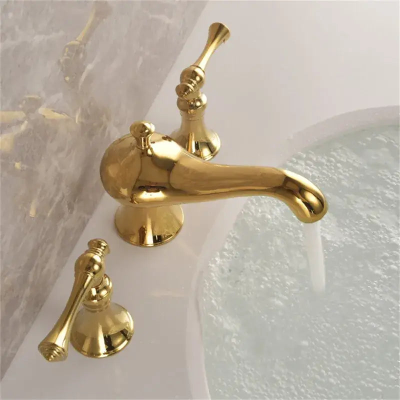 Gold widespread bathroom faucet waterfall design with lever handles