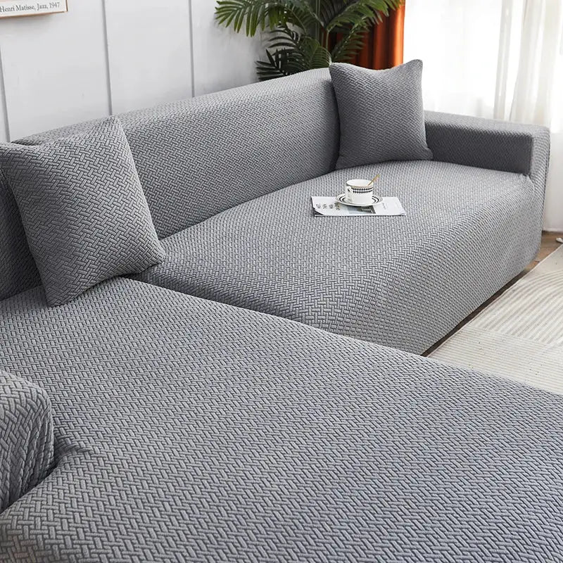 Gray textured jacquard sofa cover with pillows for living room