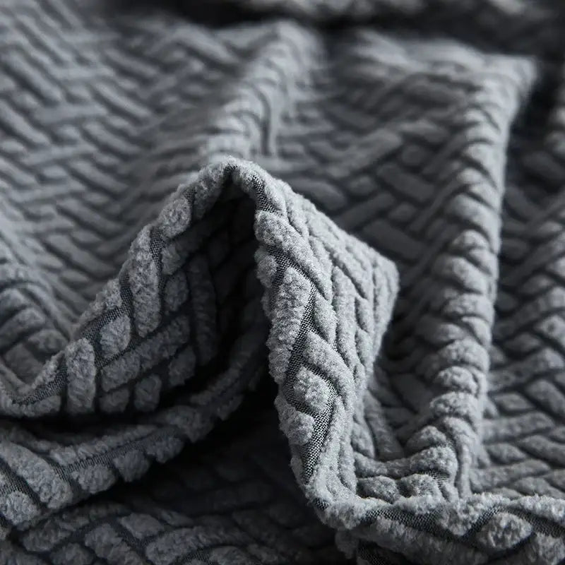 Gray textured jacquard sofa cover with pillows for living room