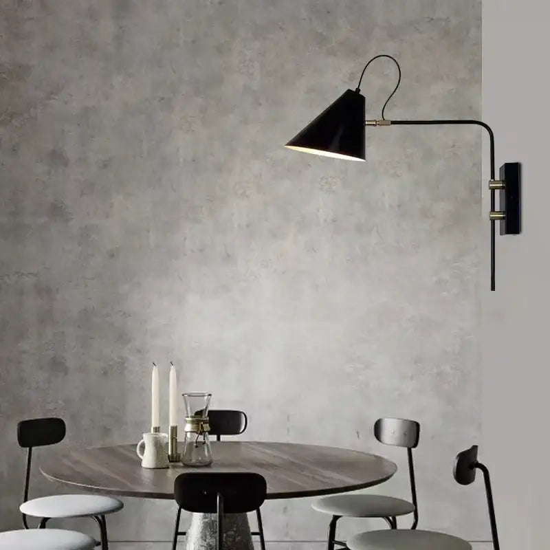 Industrial black and brass swing arm wall light living room