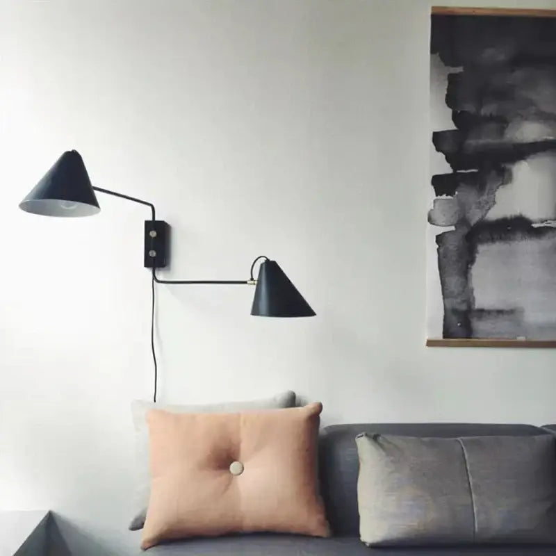 Industrial black and brass swing arm wall light living room
