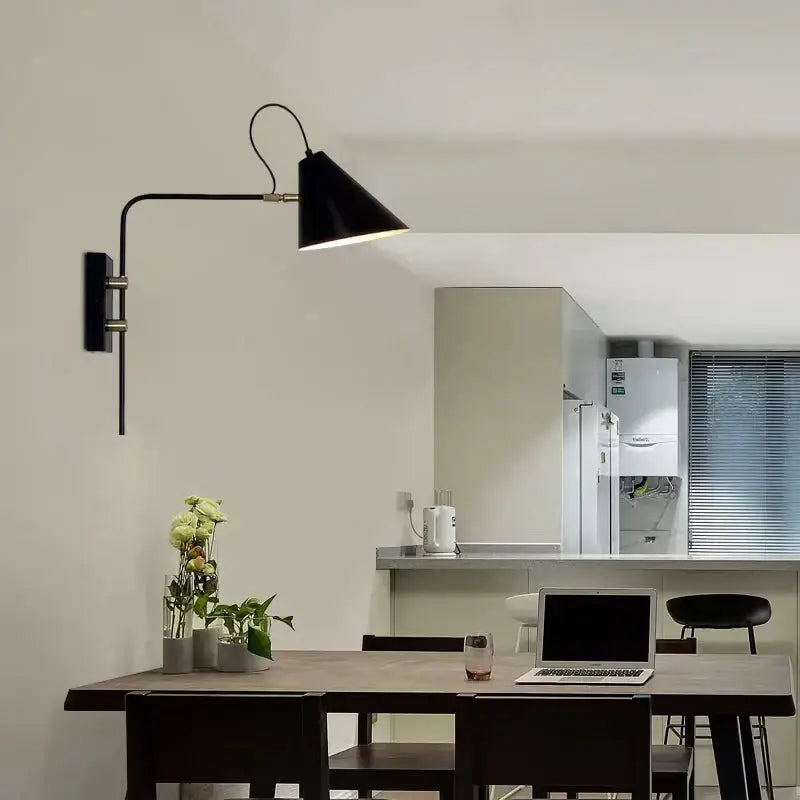 Industrial black and brass swing arm wall light living room
