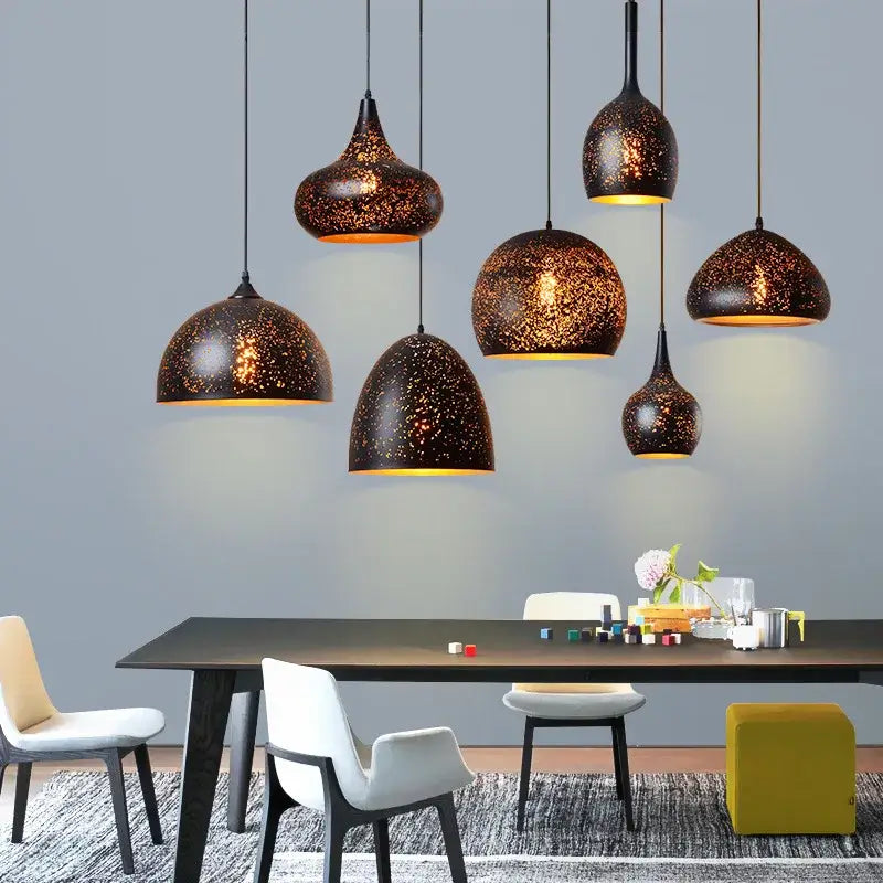 Industrial black and gold etched wrought iron chandelier dining room