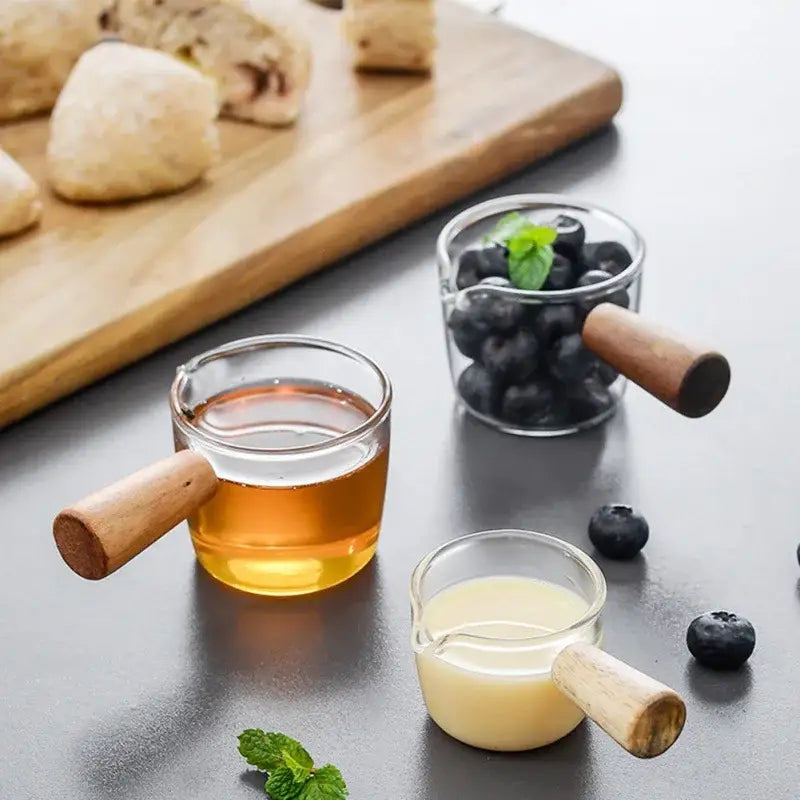 Minimalist clear glass sauce dish with wooden handle kitchen accessory