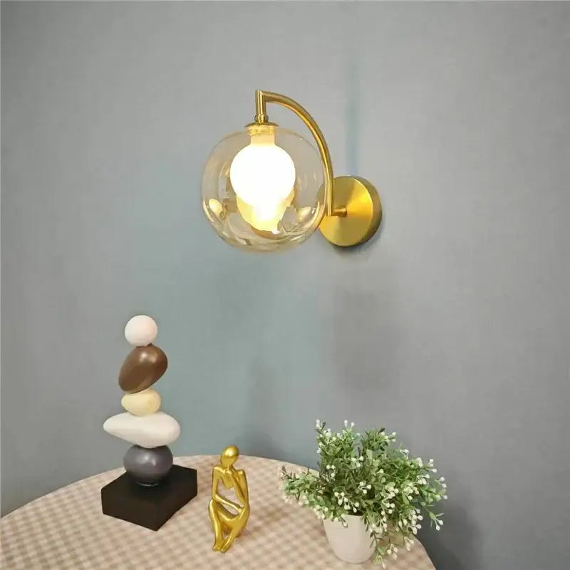 Minimalist gold glass ball wall sconce for bedroom