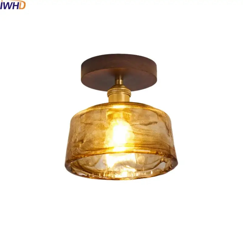 Modern amber glass and brass led ceiling lamp dining room