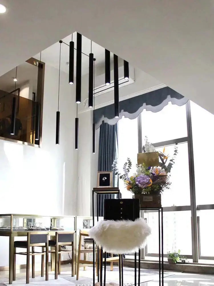 Modern black cylindrical led staircase chandelier suspension light