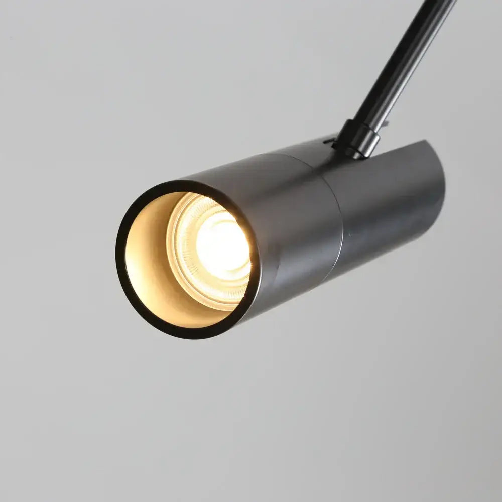 Modern black cylindrical pendant light bedroom adjustable spotlight