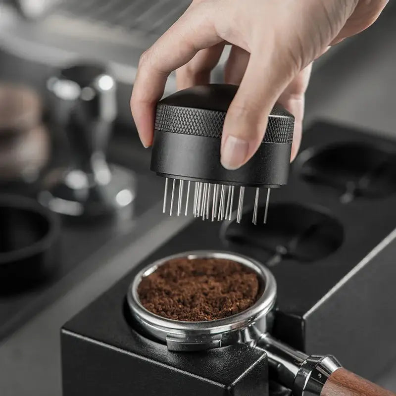 Modern black espresso needle distributor for kitchen coffee grounds