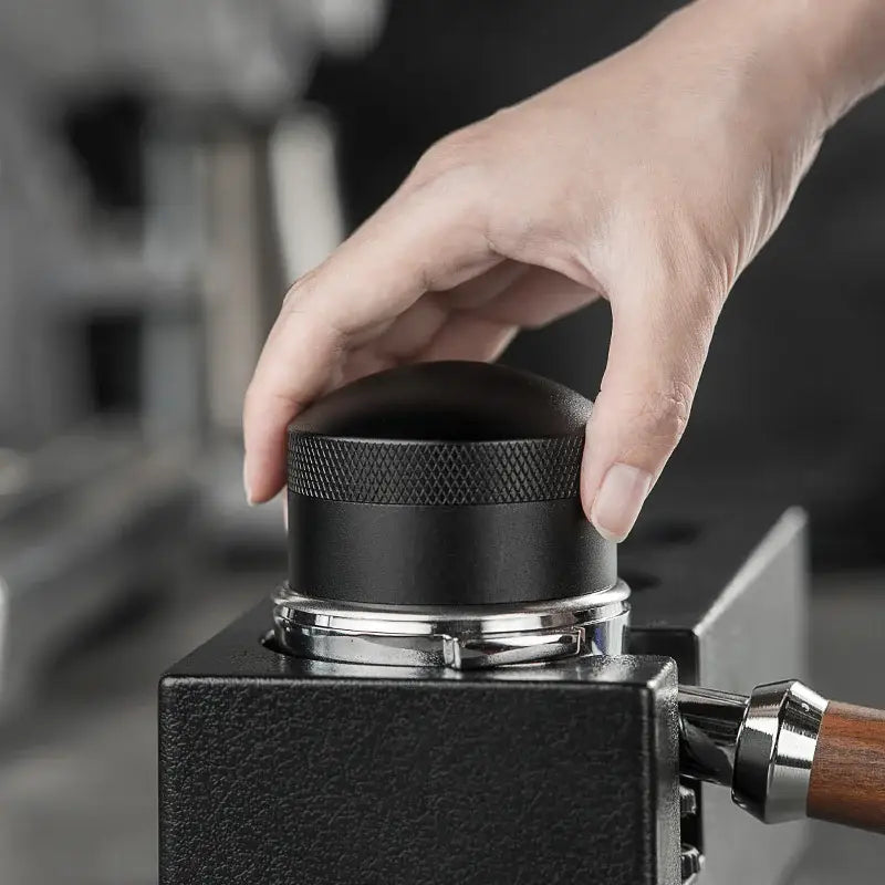 Modern black espresso needle distributor for kitchen coffee grounds