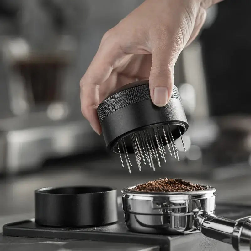 Modern black espresso needle distributor for kitchen coffee grounds