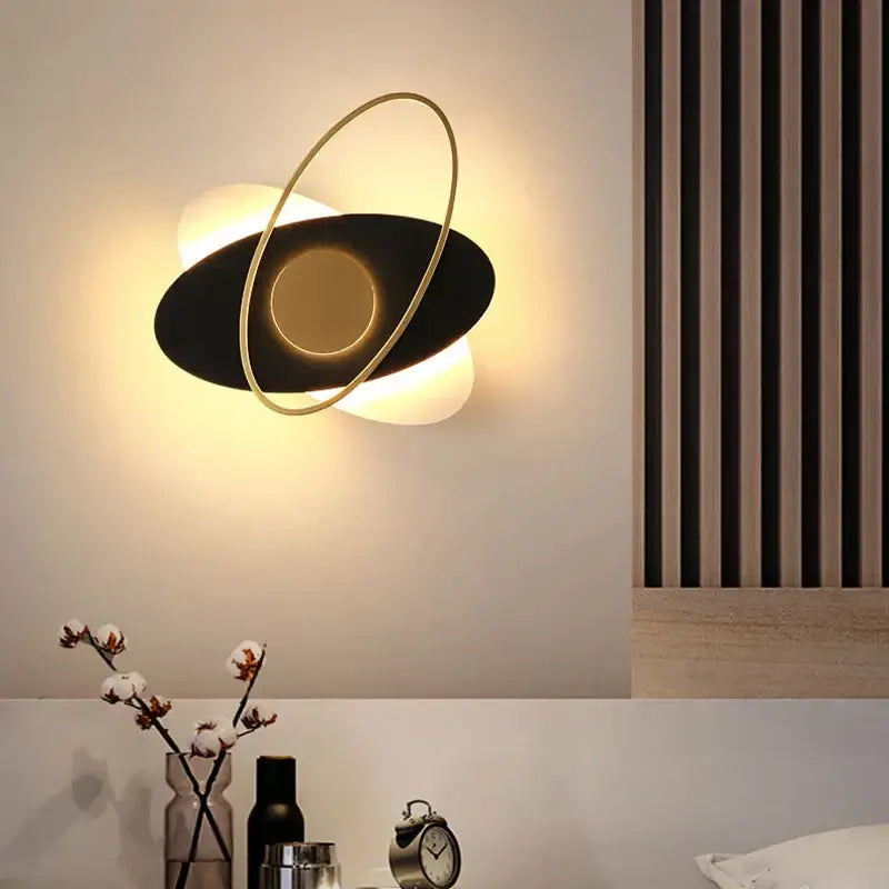 Modern black & gold orbital wall sconce light for living room
