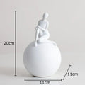 Modern black & white geometric base character statue living room decor