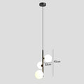Modern brass and black glass ball pendant light dining room