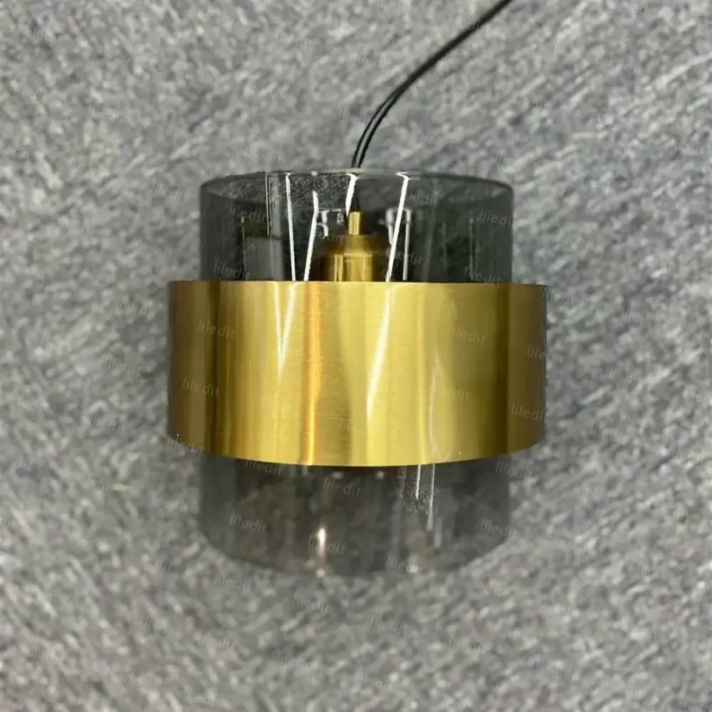 Modern brass and smoked glass pendant light dining room decorbites gold wrought iron