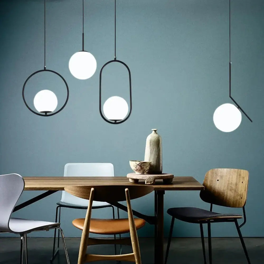Modern brass & black glass ball pendant light dining room