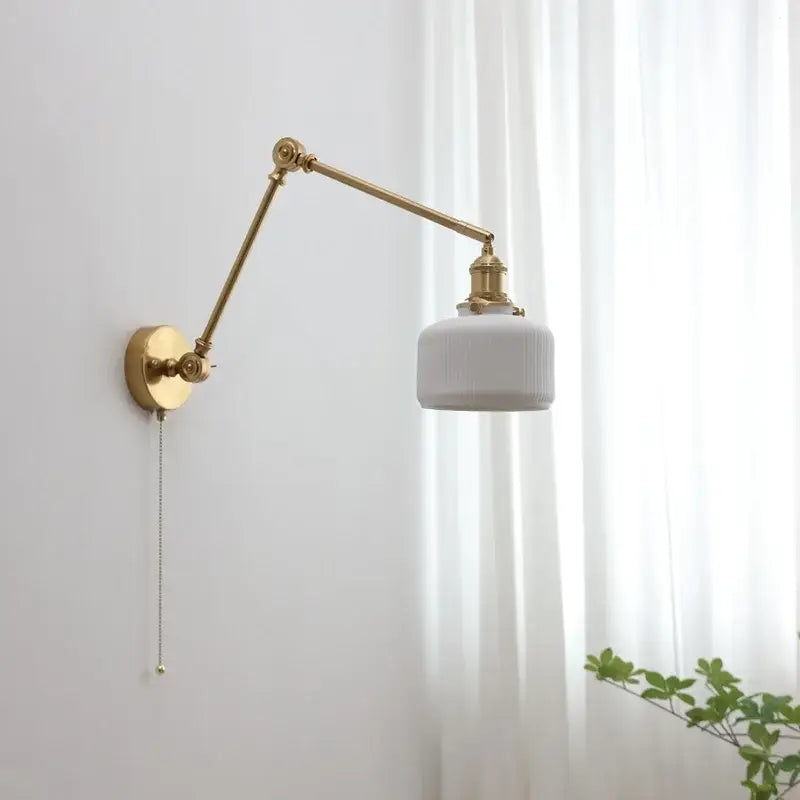 Modern brass copper swing arm wall sconce with ribbed glass bedroom light