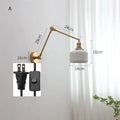 Modern brass copper swing arm wall sconce with ribbed glass bedroom light