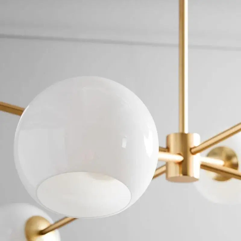 Modern brass glass chandelier with clear glass shades for dining room