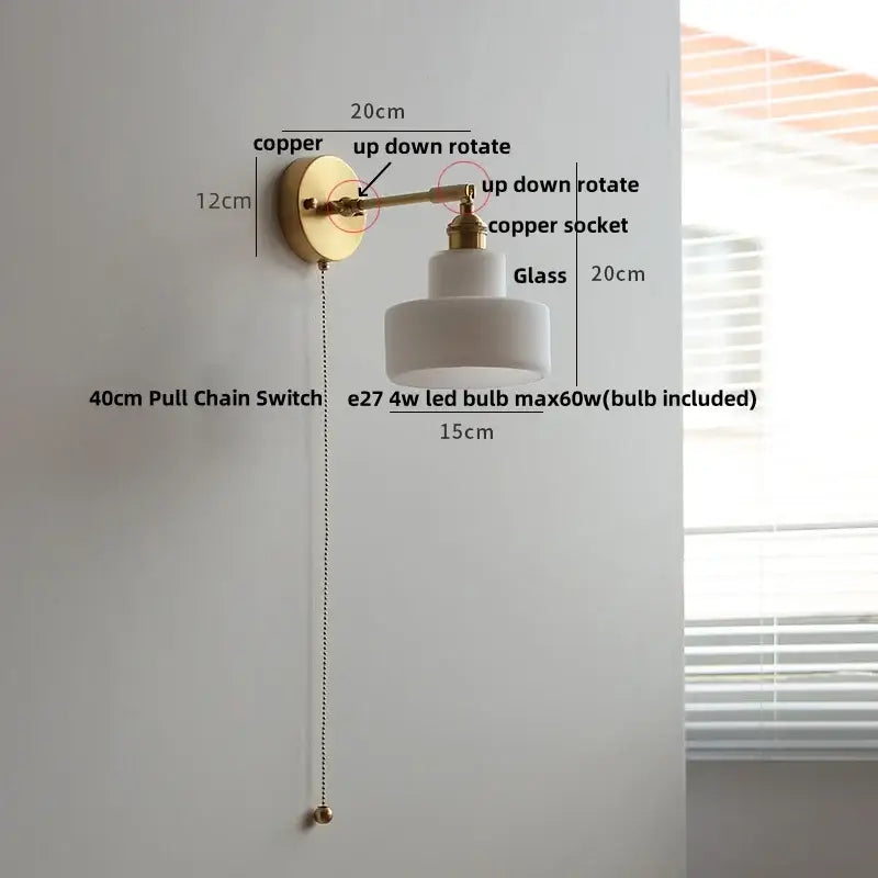 Modern brass wall lamp with clear glass shade bedroom reading light