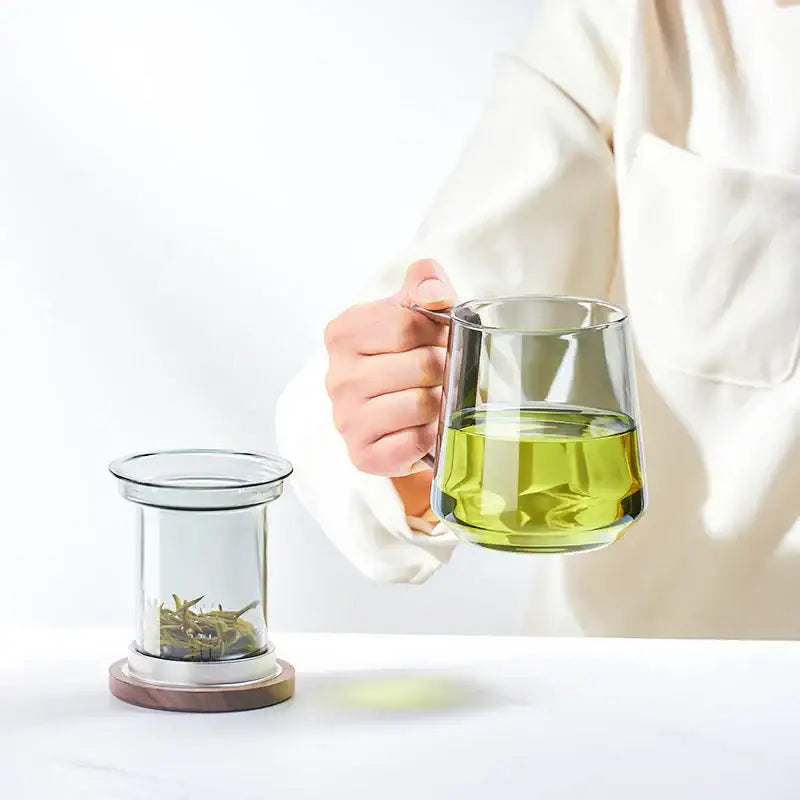 Modern glass tea cup with wood handle for kitchen drinking